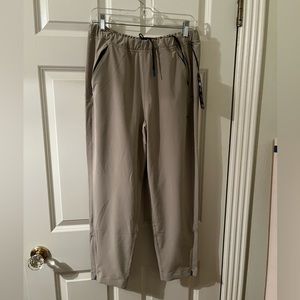 Janji Tech pants size L tan